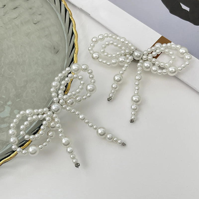 موضة جديدة تقليد اللؤلؤ القوس  - مراجعة Women'S Jeans Accessories Chain وسعره
